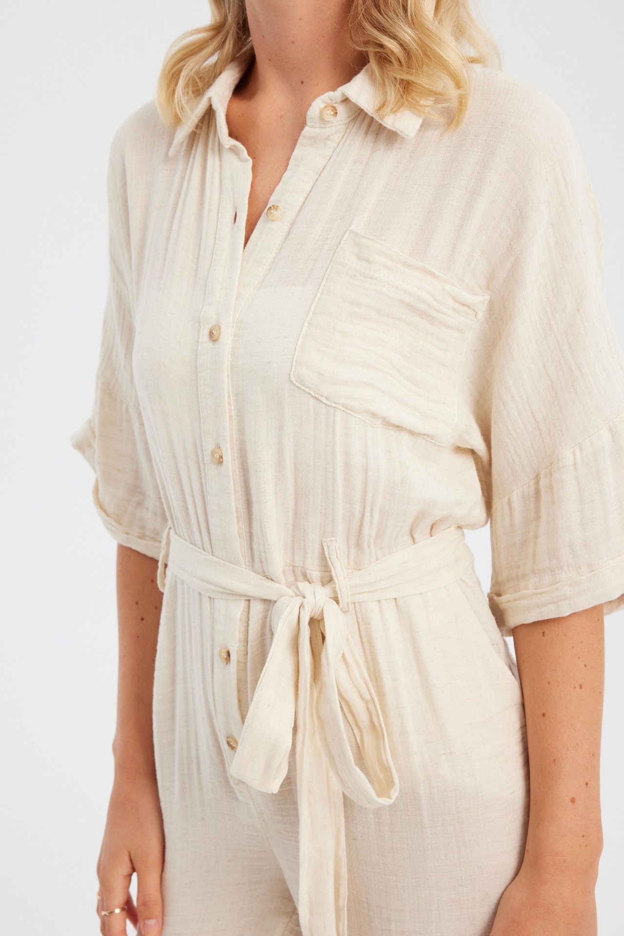 Shirt Collar Pocket Straight Leg Muslin Jumpsuit with a Belt Detail