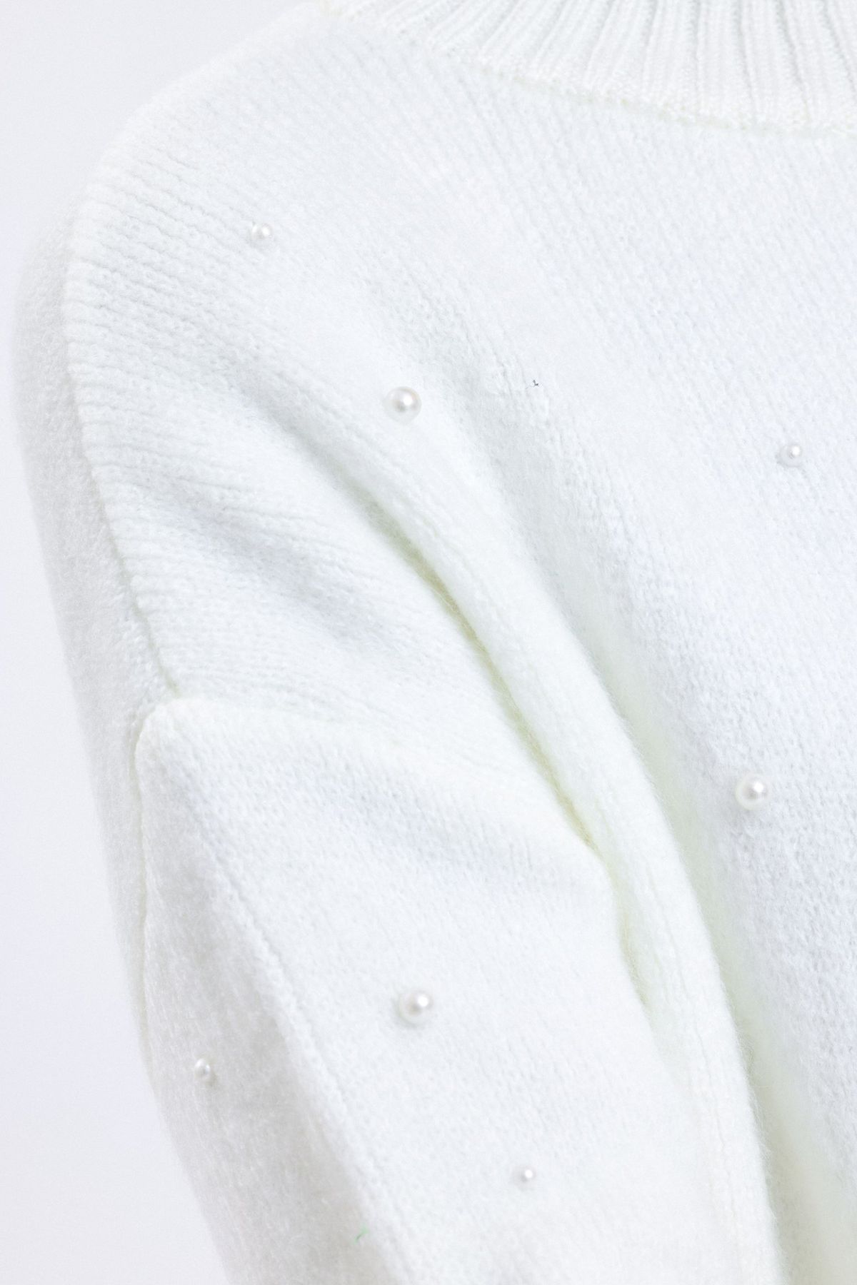 Solid High Neck Sweater with a Pearl Detail