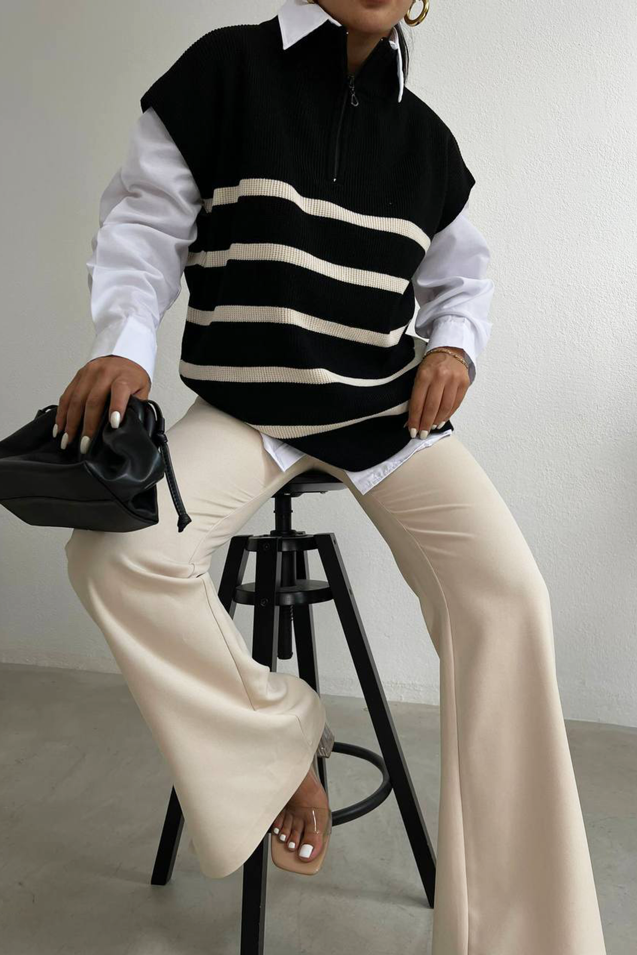 Striped Sleeveless Sweater with a Zippered Neck