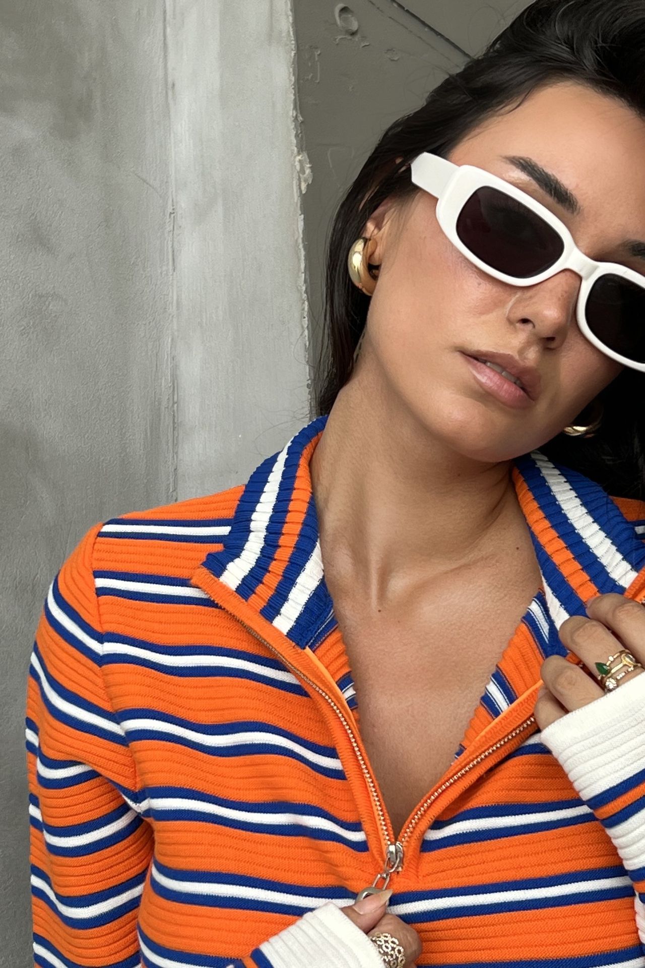 Striped Sweater with a Zippered Neck