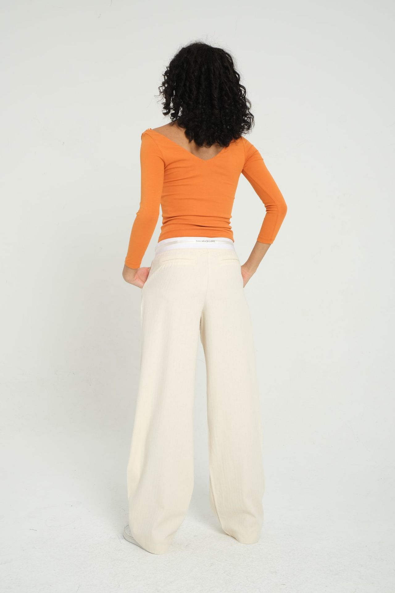 High Waist Pleated Trousers with a Belt Detail