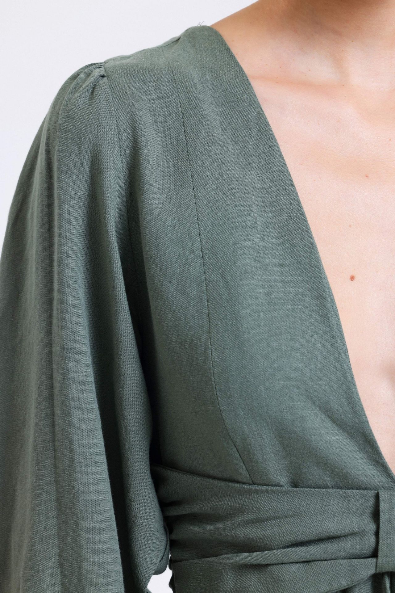 Linen Plunge Neck Long Sleeve Playsuit with a Back Cut Out