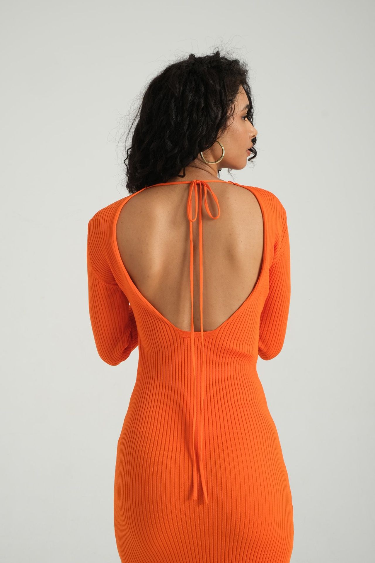 Knitted Round Neck Long Sleeve Midi Dress with a Back Cut Out