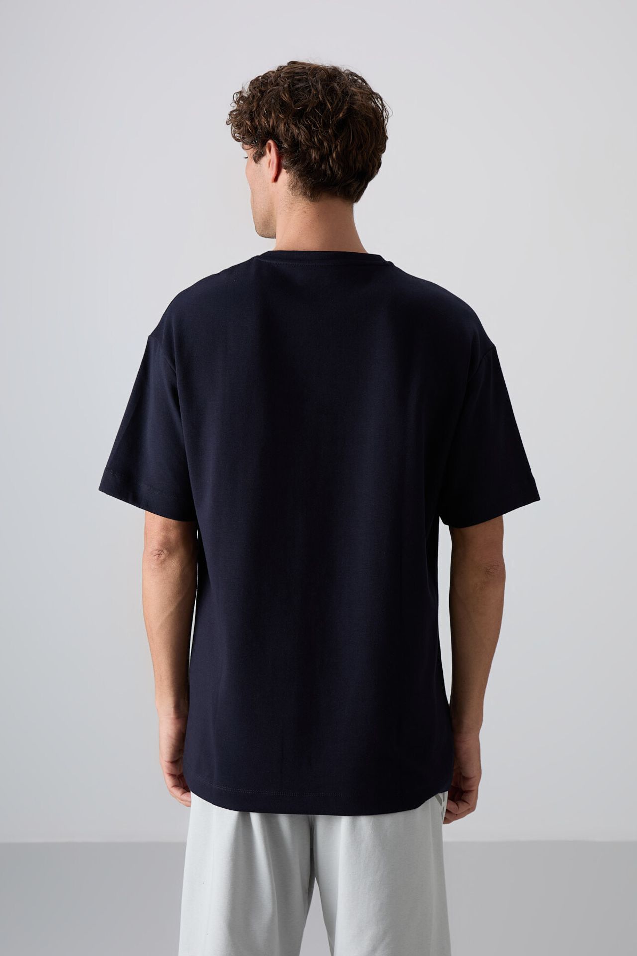 TOMMY Oversized Cotton-Blend Logo T-Shirt 6