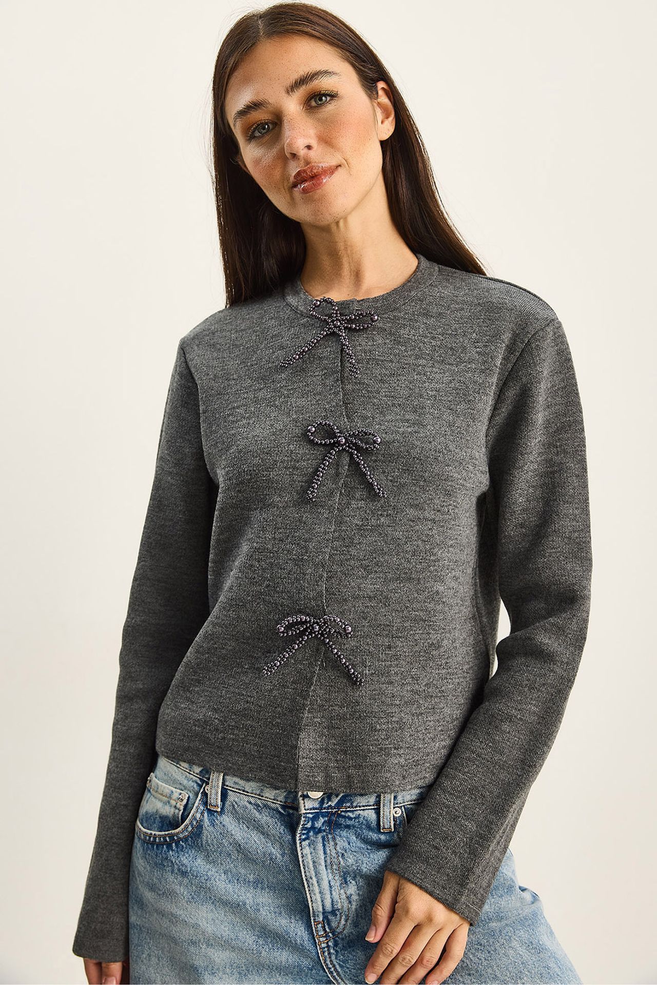 LUCCI Crew Neck Knit Cardigan with Bow Detail 1