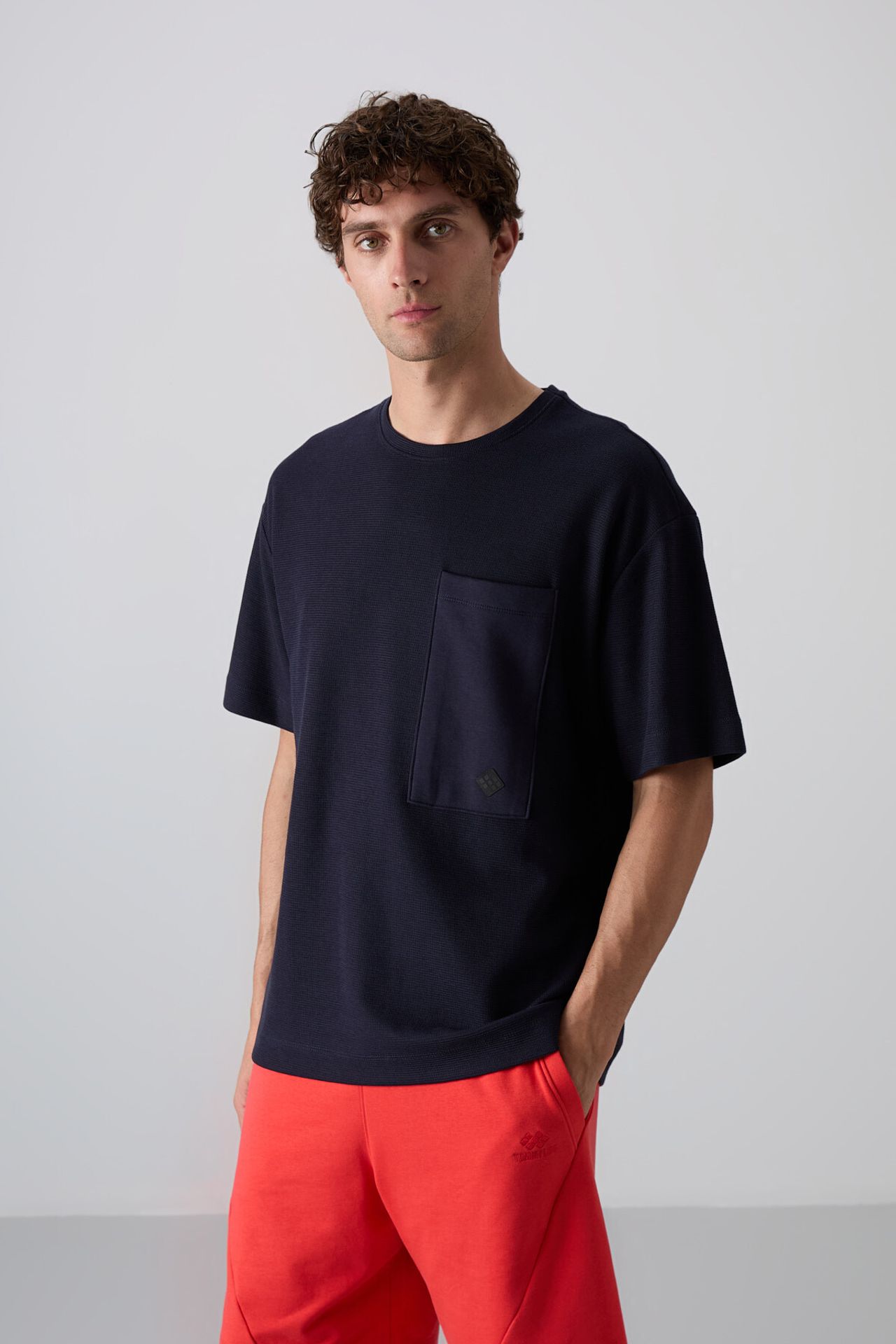 TOMMY Oversized Cotton-Blend Crew Neck T-Shirt With Pocket 1