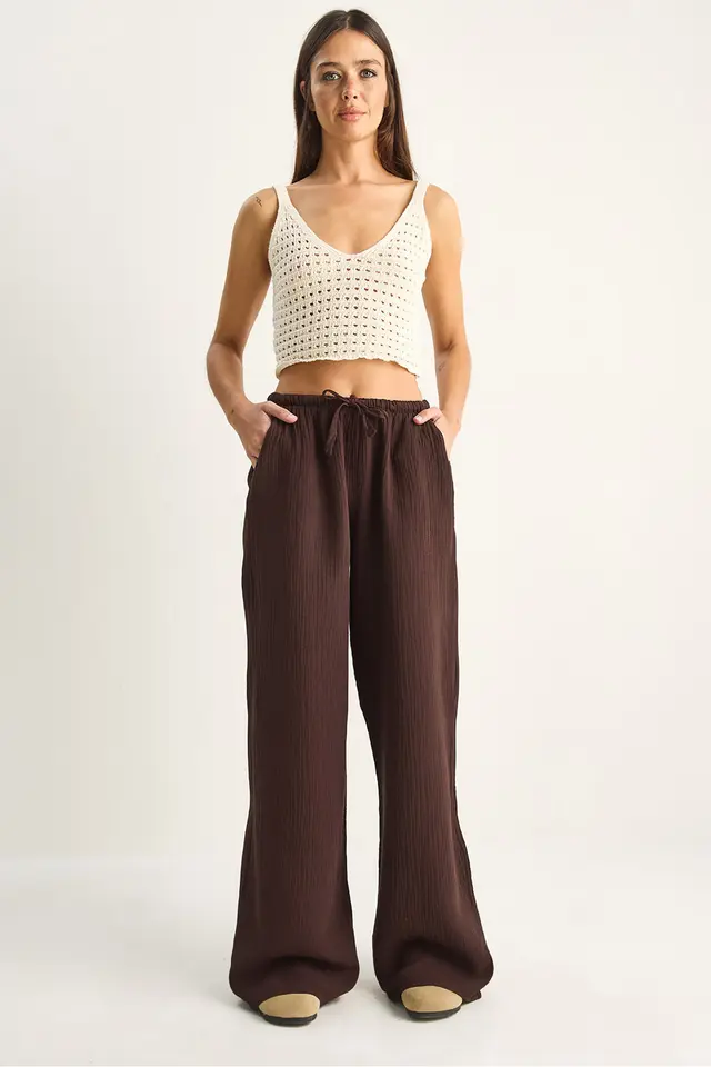 LUCCI Wide-leg Cotton Crepe Trousers