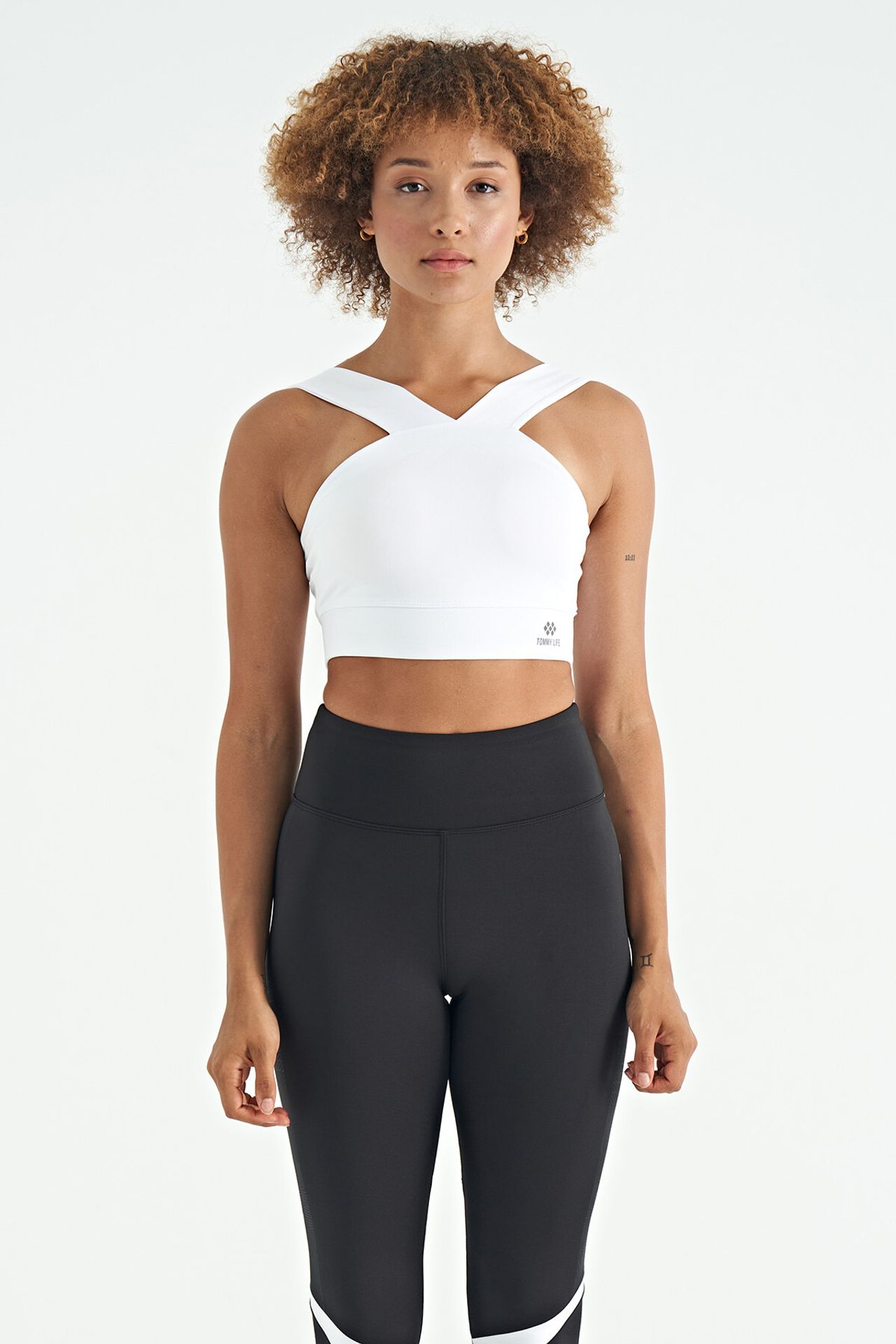 TOMMY Women's Cropped Sleeveless V-neck Sports Top 1