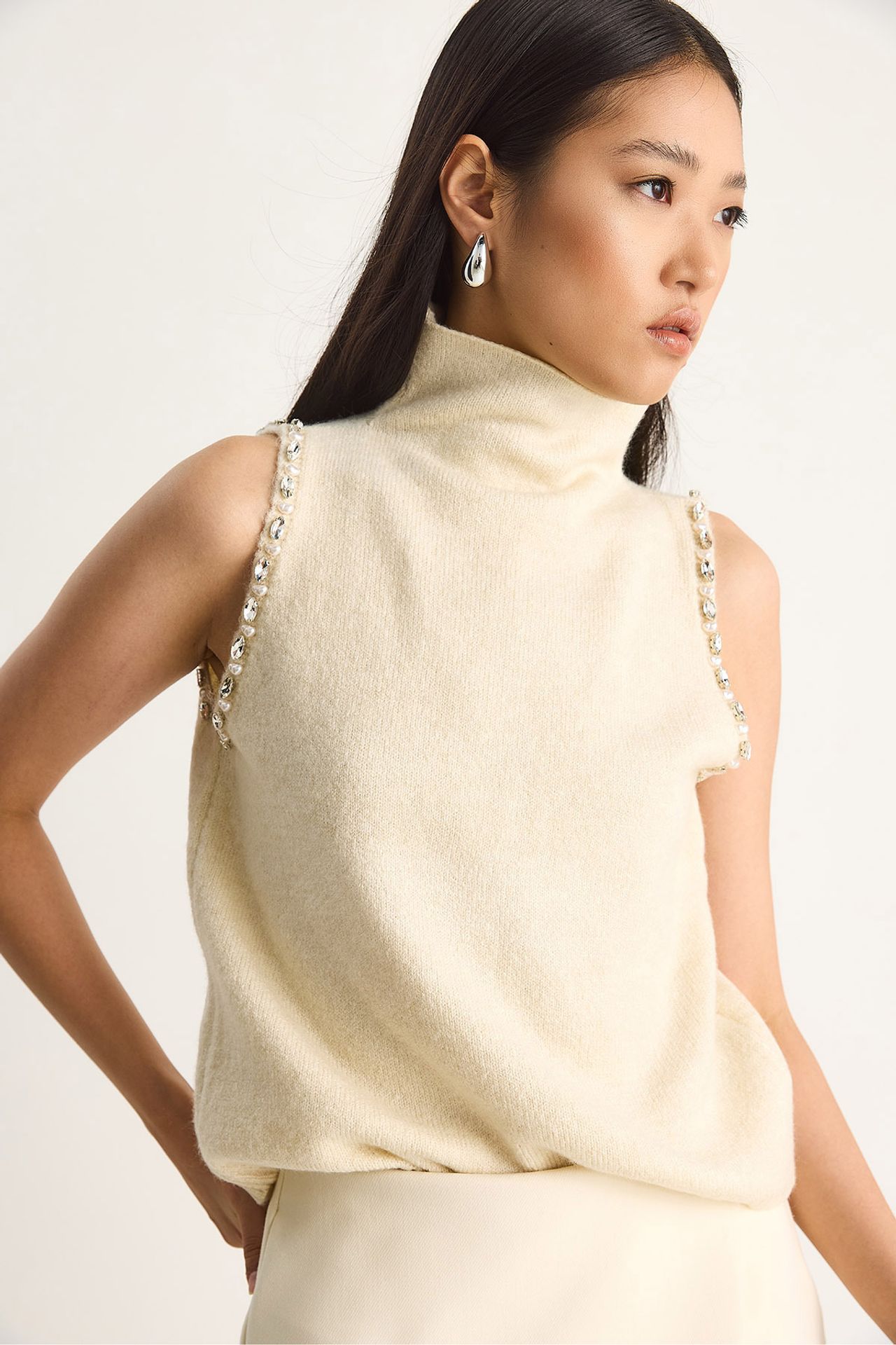 LUCCI Turtleneck Blouse with Pearl Detail