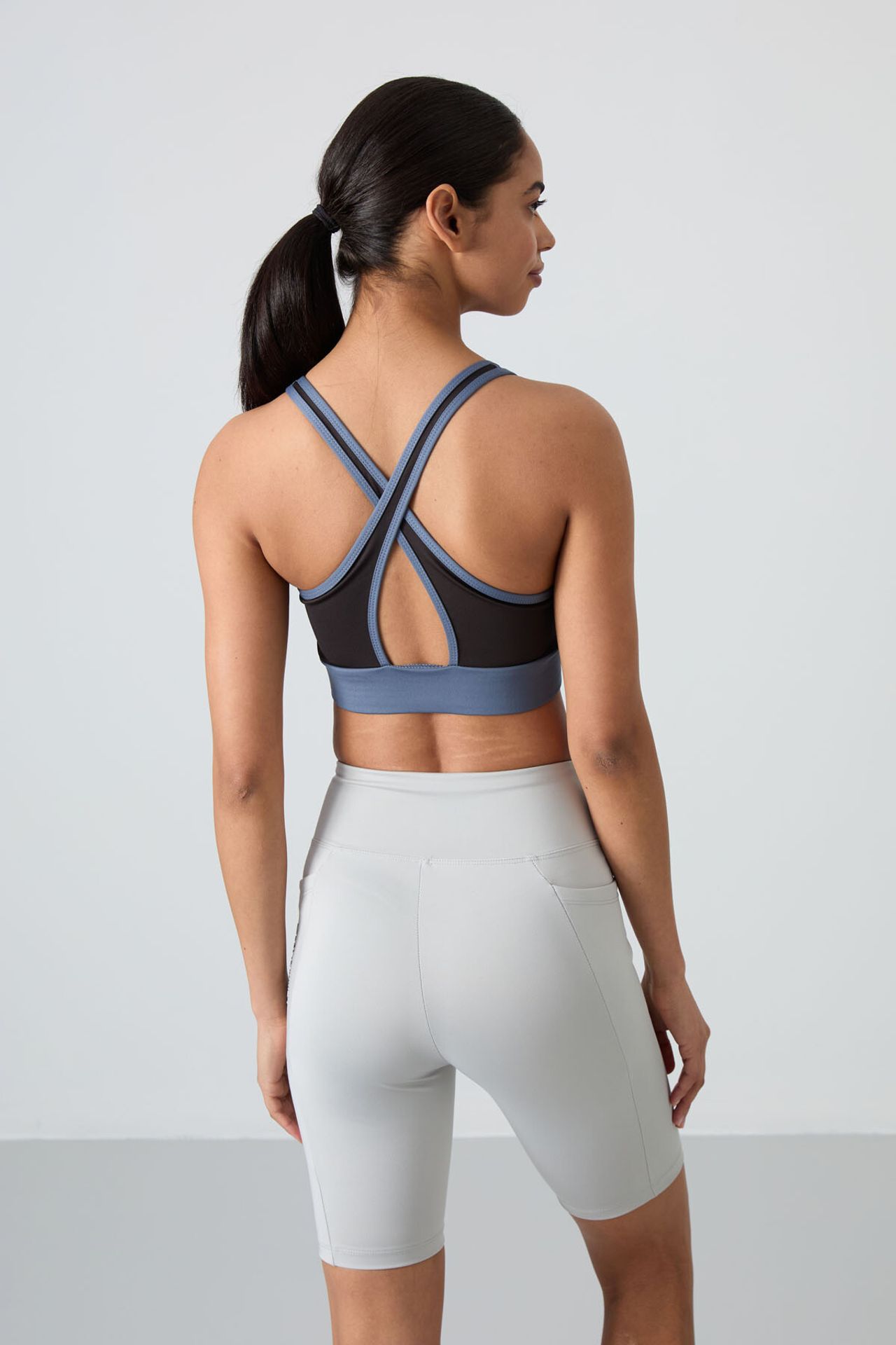 TOMMY Fitted Sleeveless Crop Sports Top 6