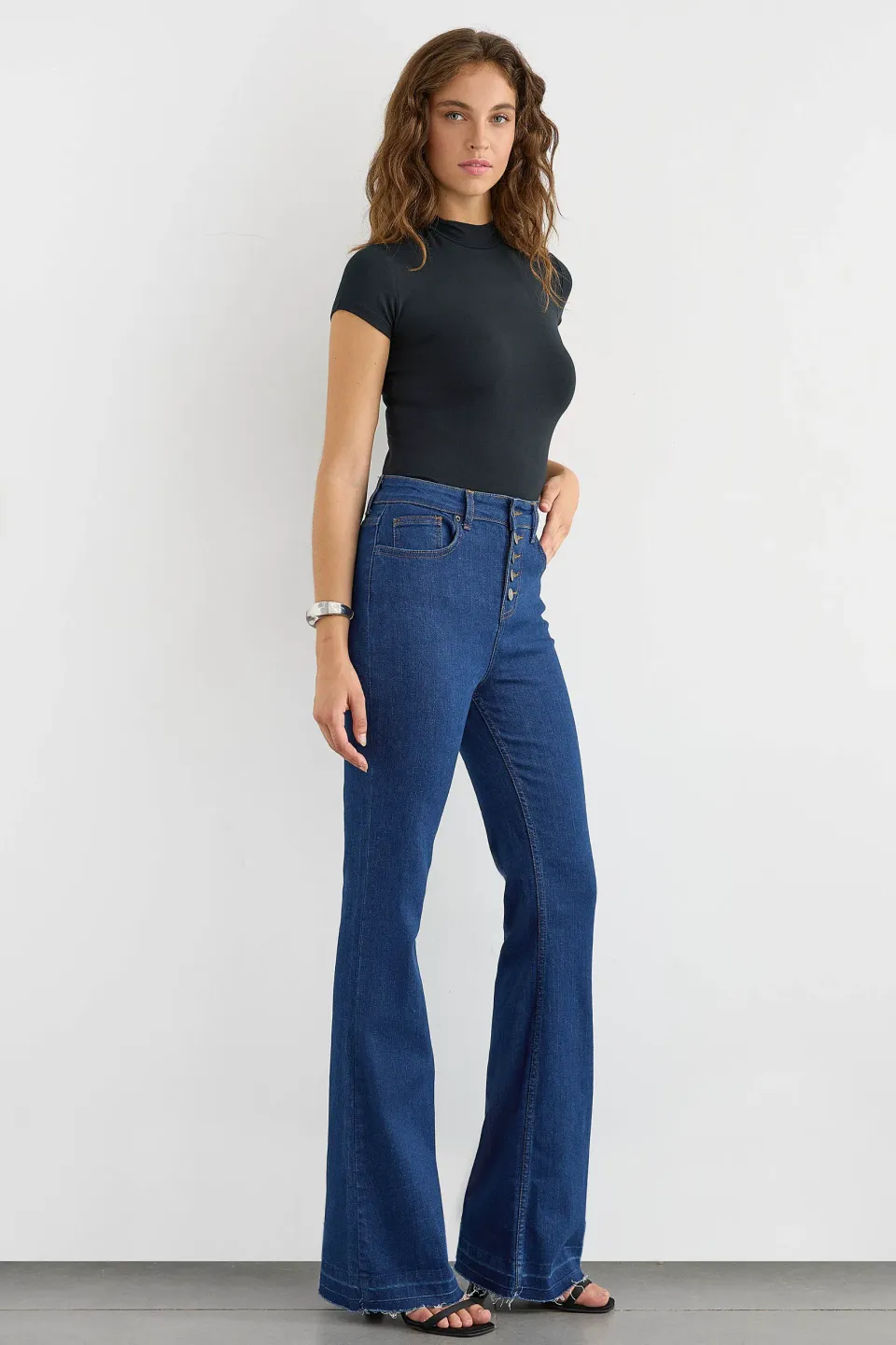 High-Waist Flare Jeans with Button Detail