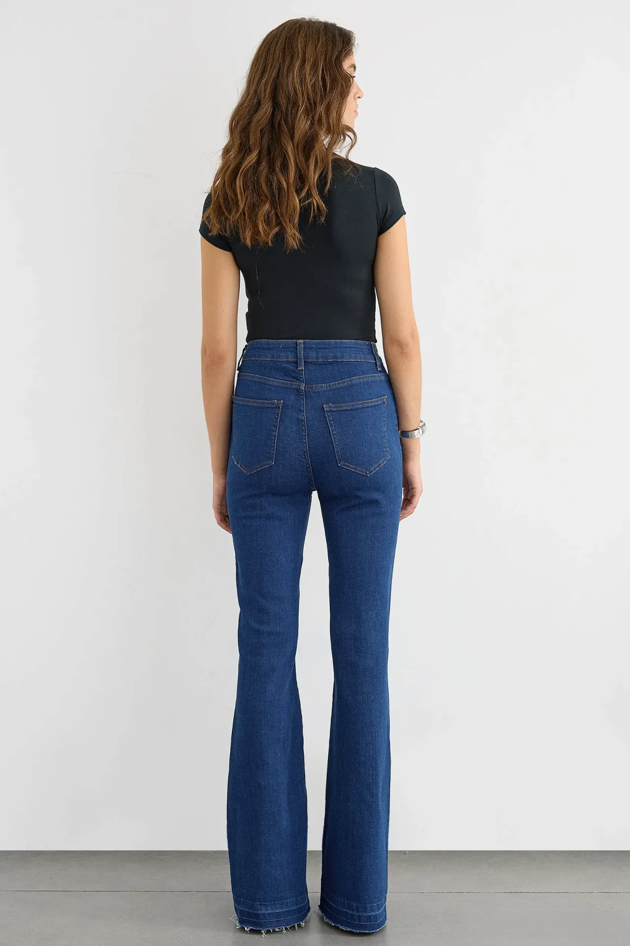 High-Waist Flare Jeans with Button Detail