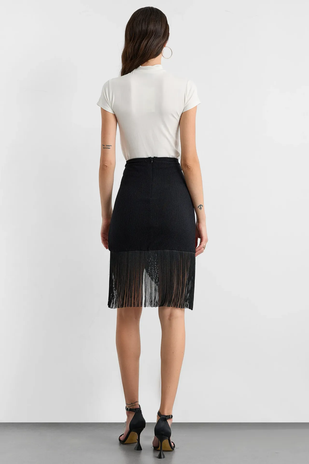 Asymmetric Mini Skirt with Tassel Detail