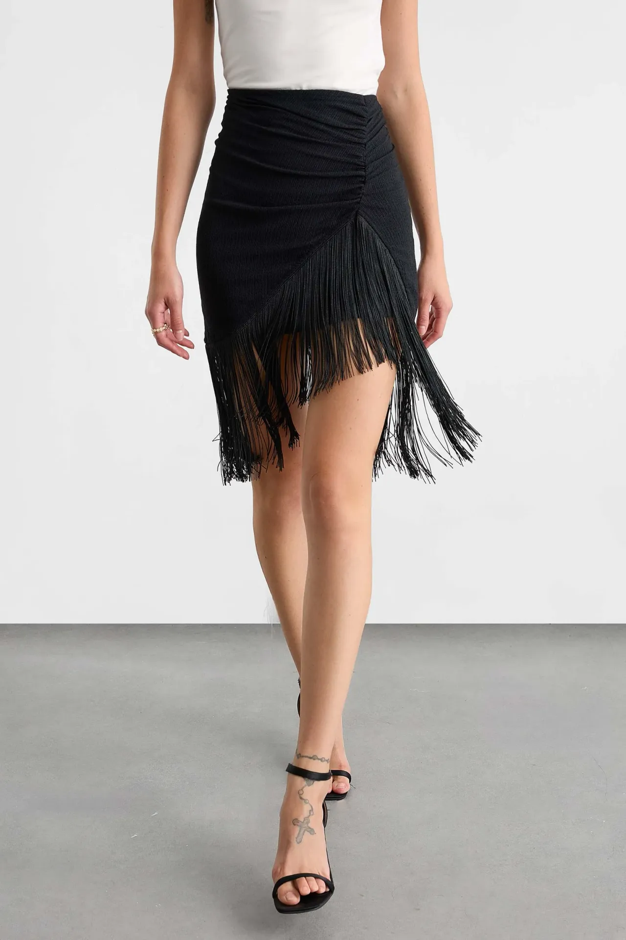 Asymmetric Mini Skirt with Tassel Detail