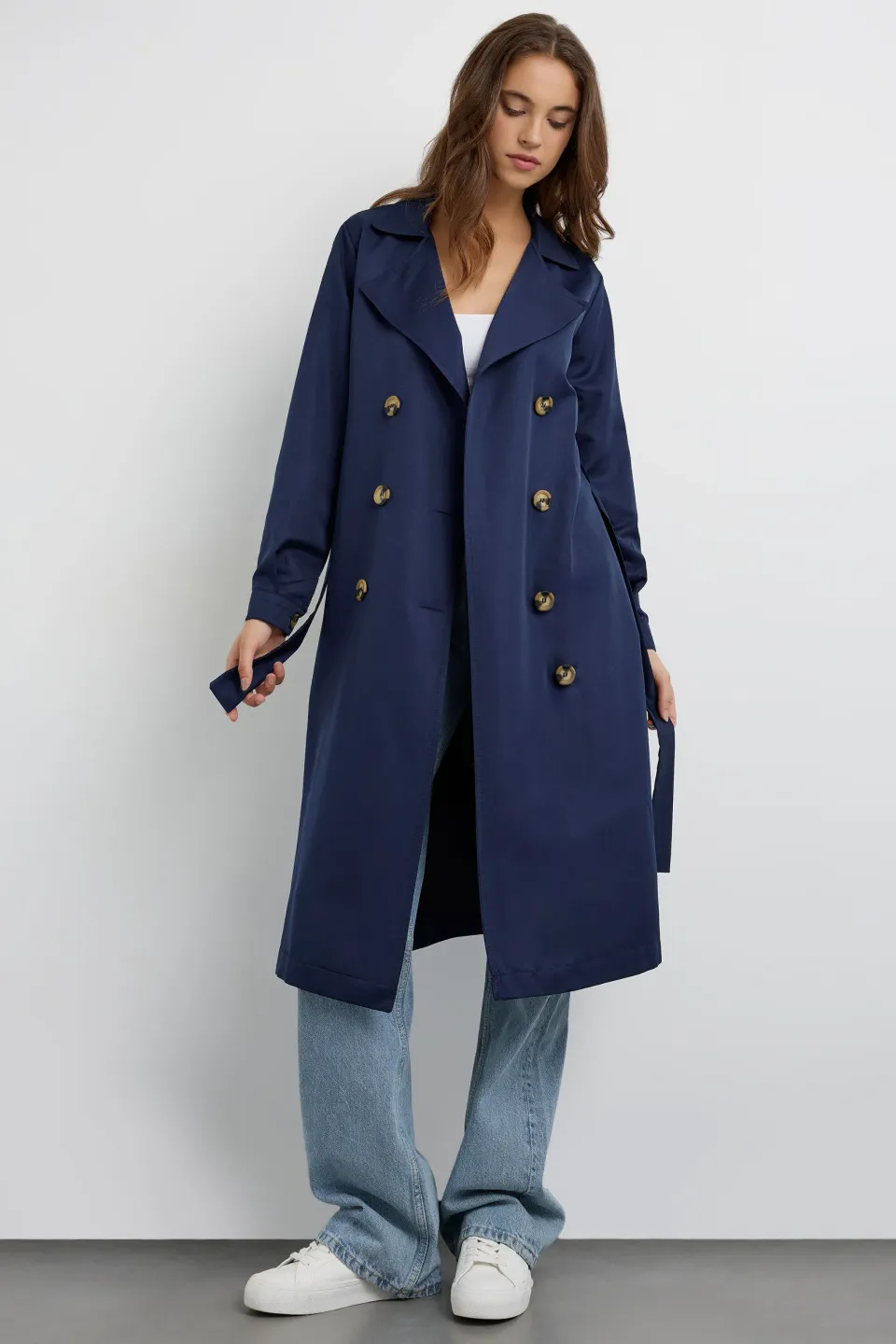 Buttoned Light Trenchcoat with a Belt