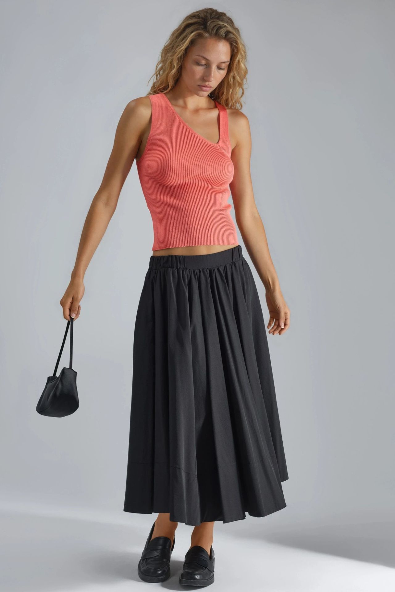Fitted Asymmetrical Neck Ribbed Sleeveless Knit Top 6