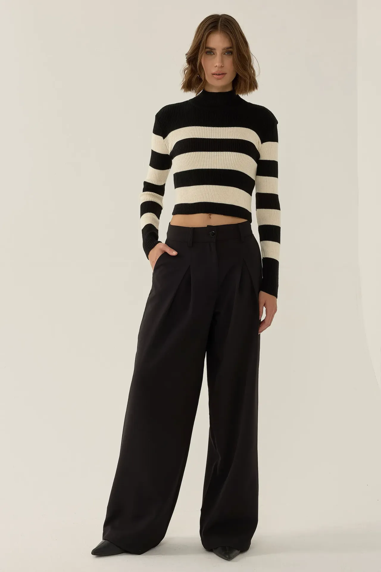 Maglione a collo alto a righe