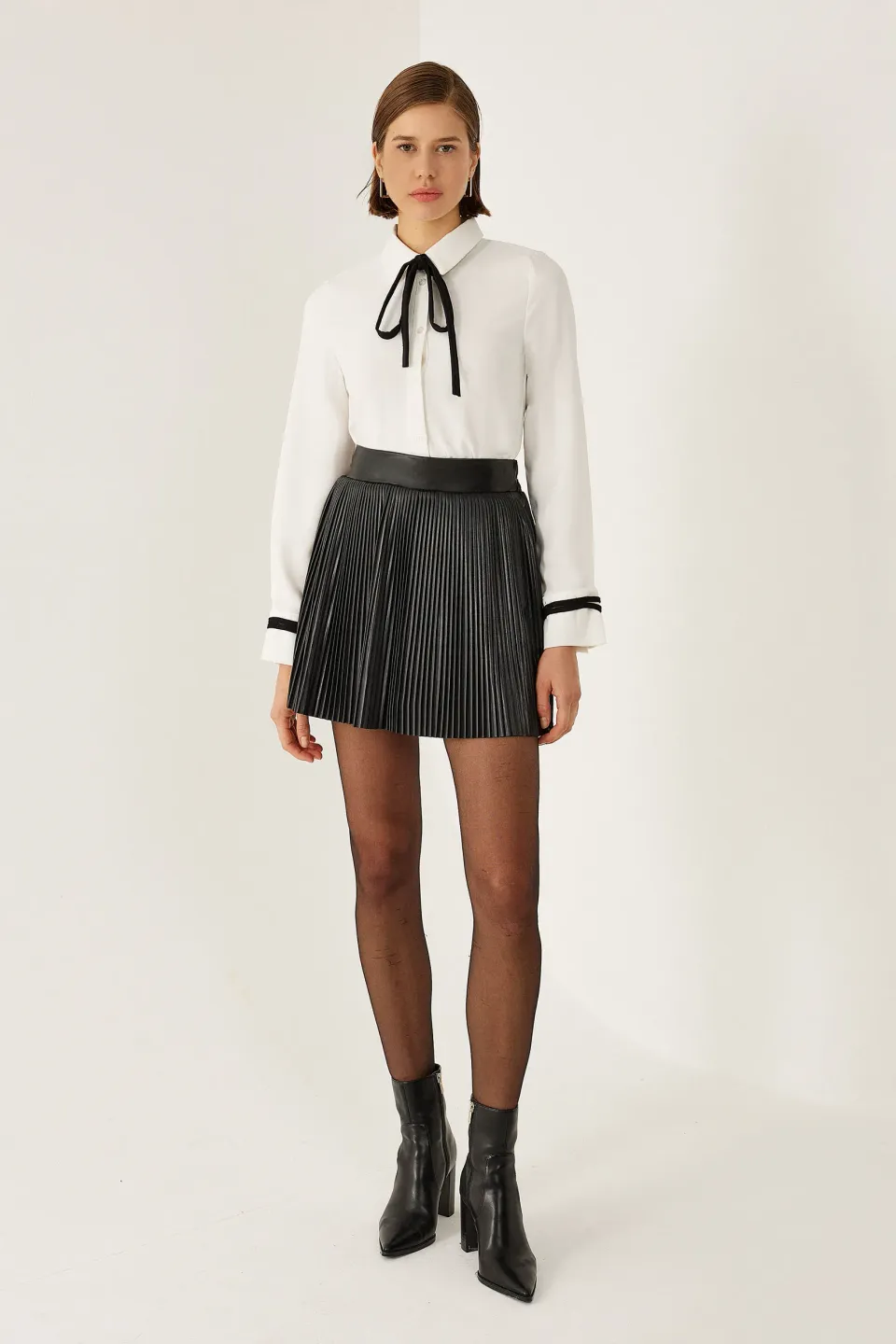 High Waist A-Line Mini Skirt in Faux Leather