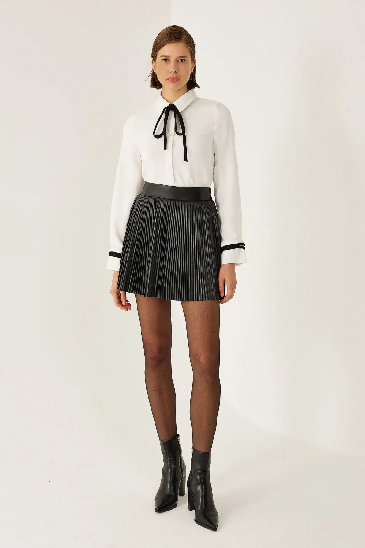 High Waist A-Line Mini Skirt in Faux Leather 3
