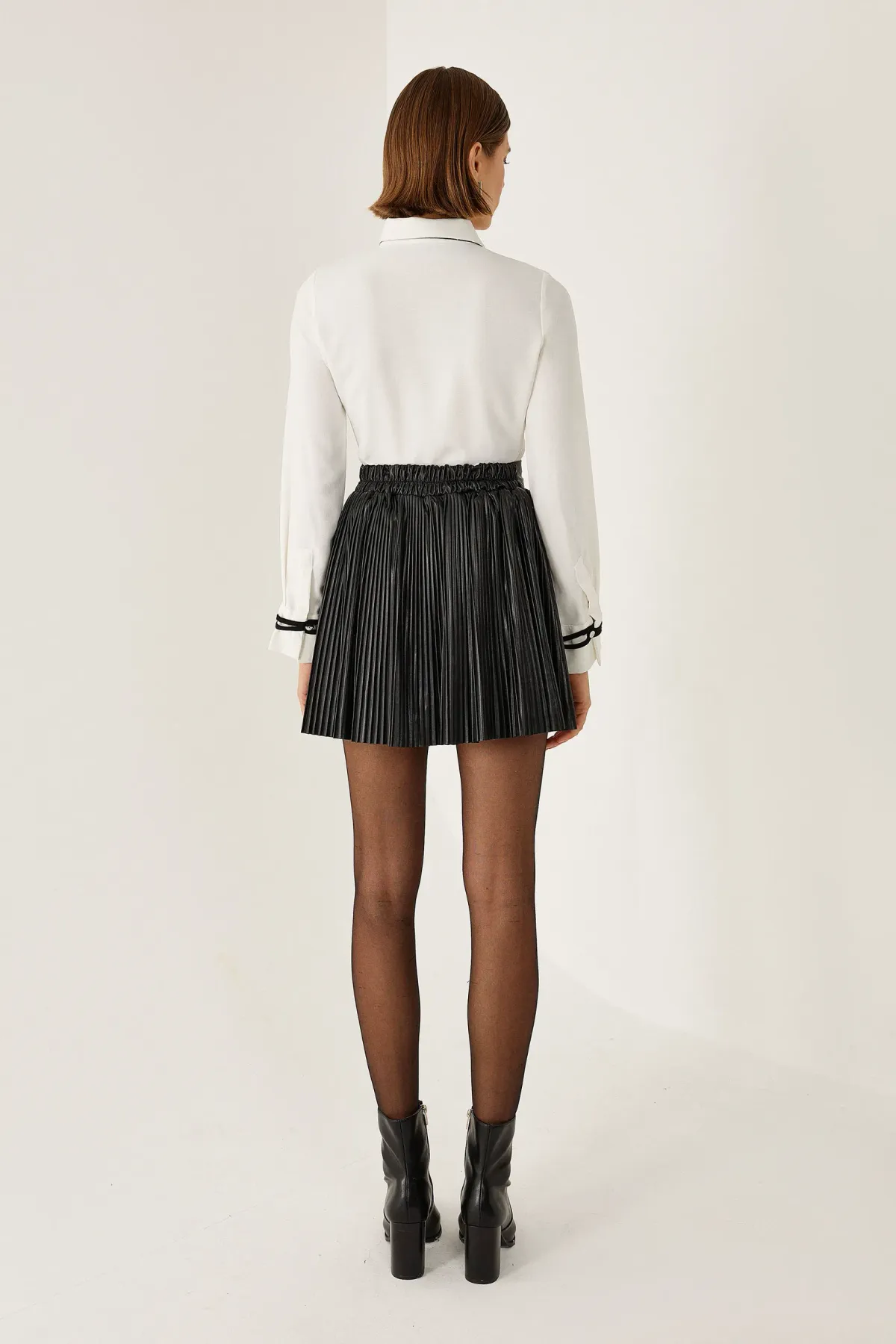 High Waist A-Line Mini Skirt in Faux Leather 4