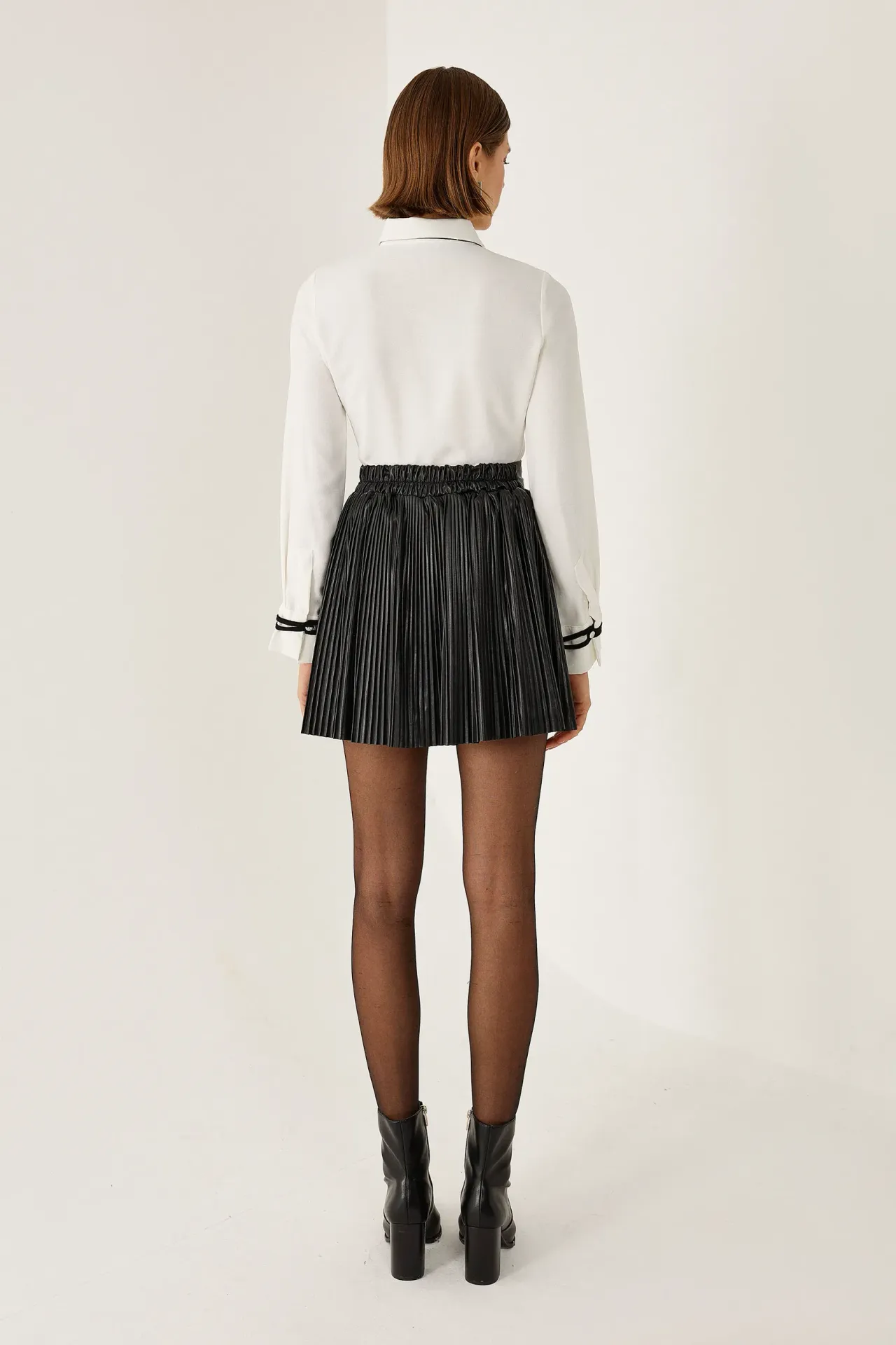 High Waist A-Line Mini Skirt in Faux Leather