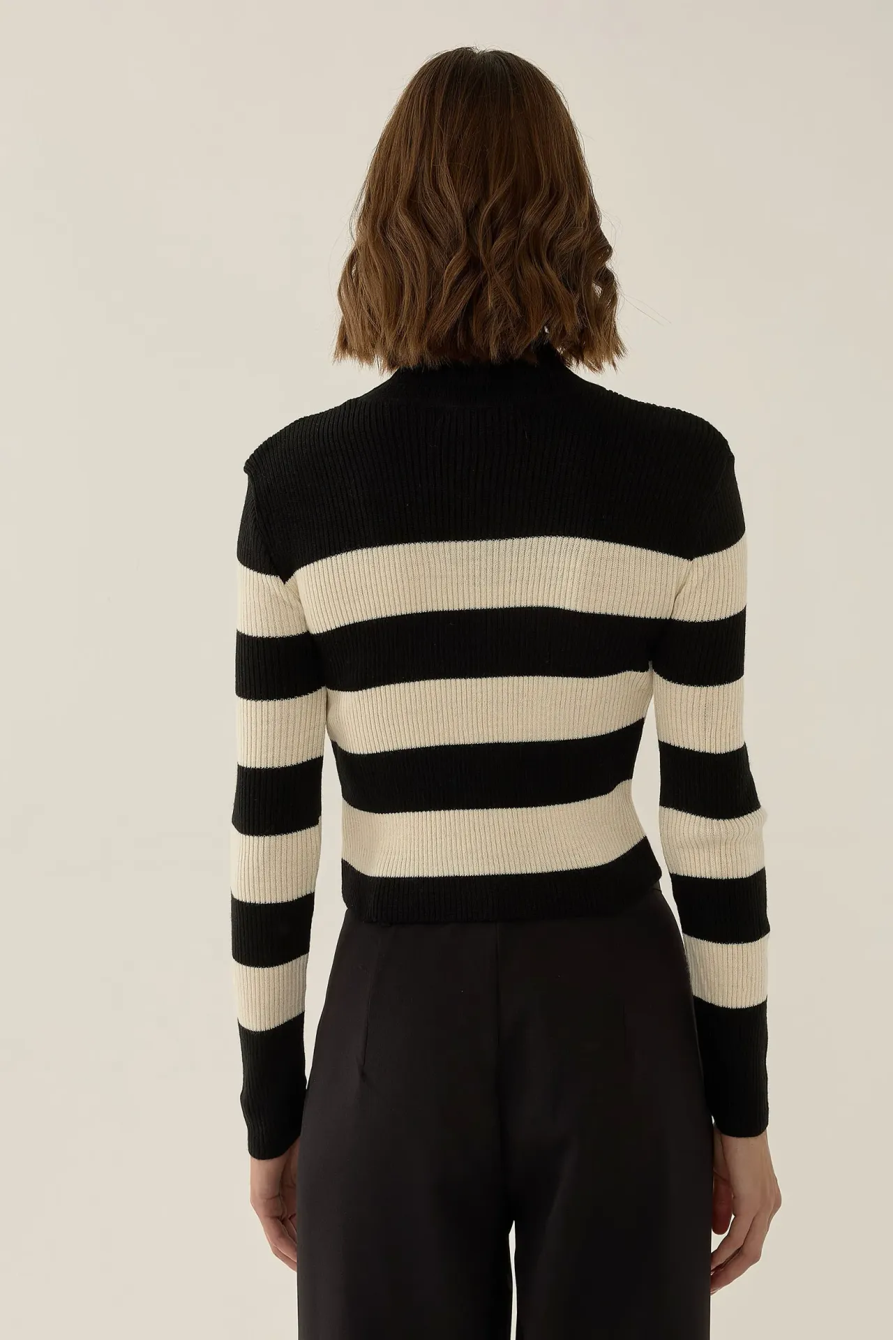 Maglione a collo alto a righe