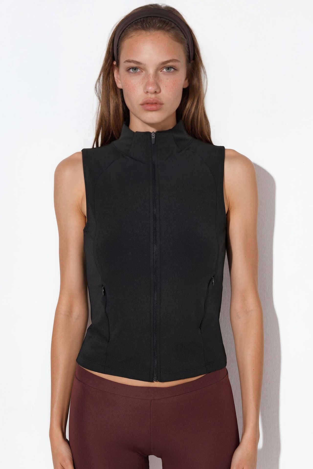 Fitted Turtleneck Sleeveless Active Top 8