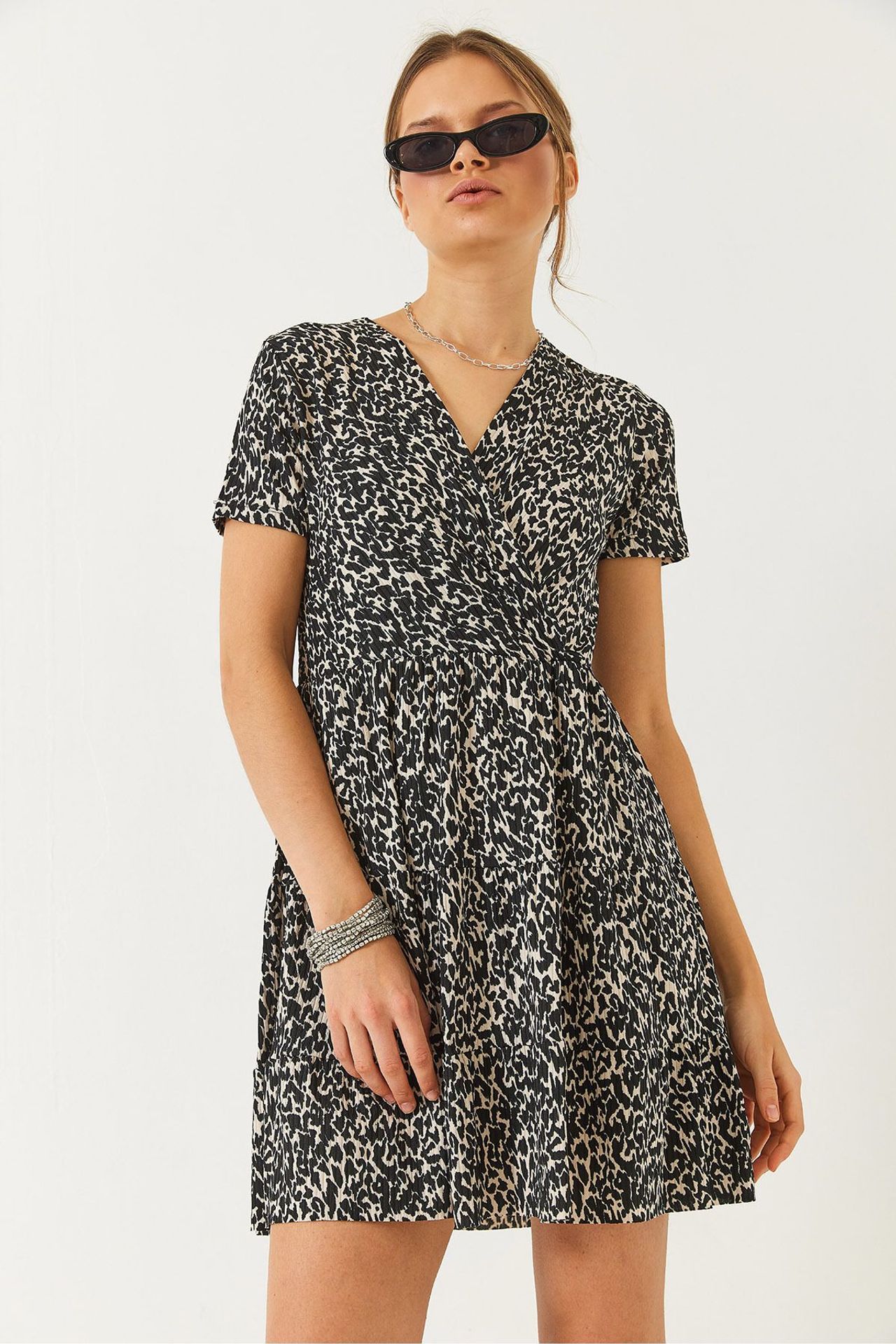 LUCCI Spotted V-Neck Mini Dress 4