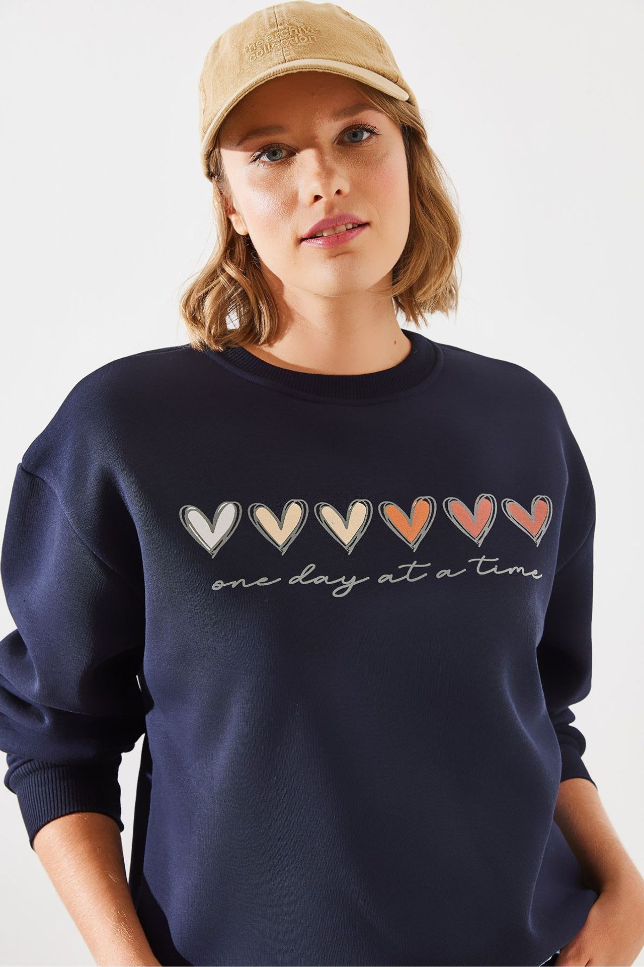 LUCCI Heart Print Crew Neck Sweatshirt